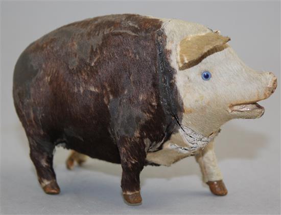 An early 20th century musical pig, probably French, 5.5in.